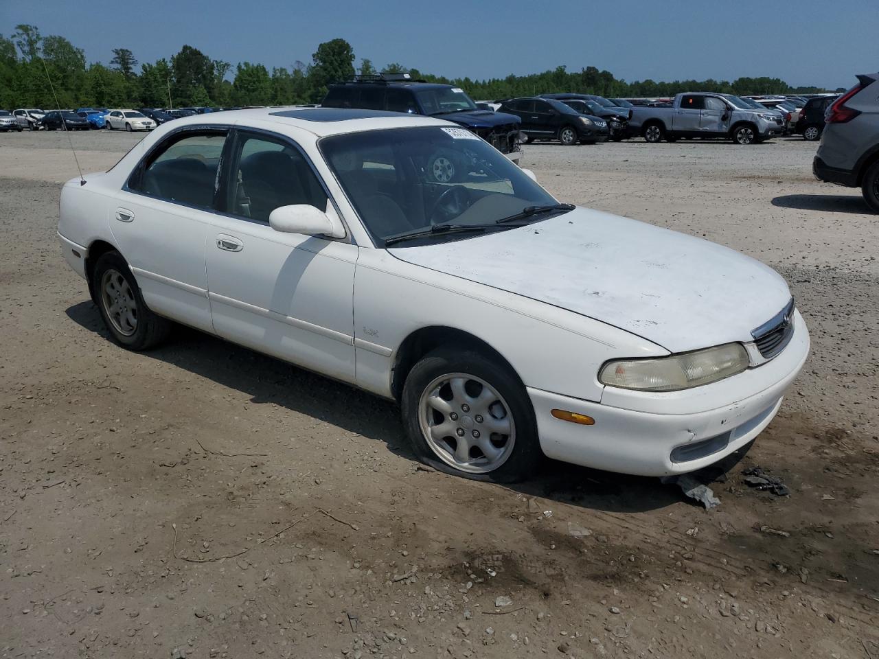 1YVGE22D7V5615628 1997 Mazda 626 Es