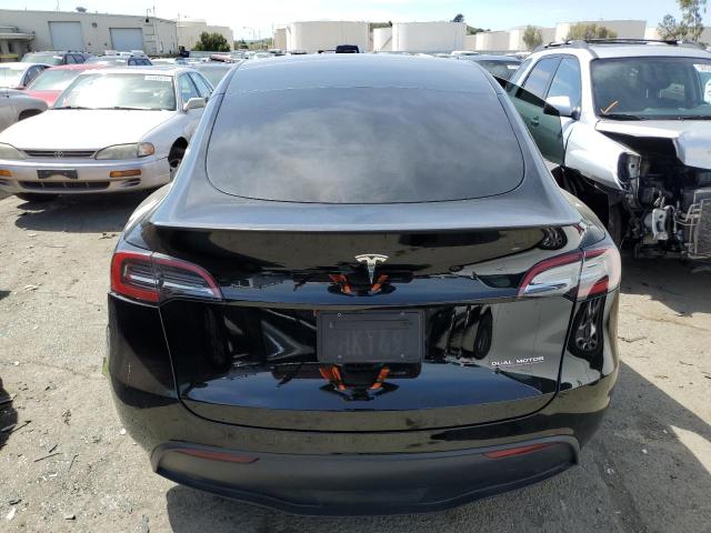 2023 Tesla Model Y VIN: 7SAYGDEF6PF833349 Lot: 50991094