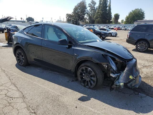 2023 Tesla Model Y VIN: 7SAYGDEE0PA119611 Lot: 49723594