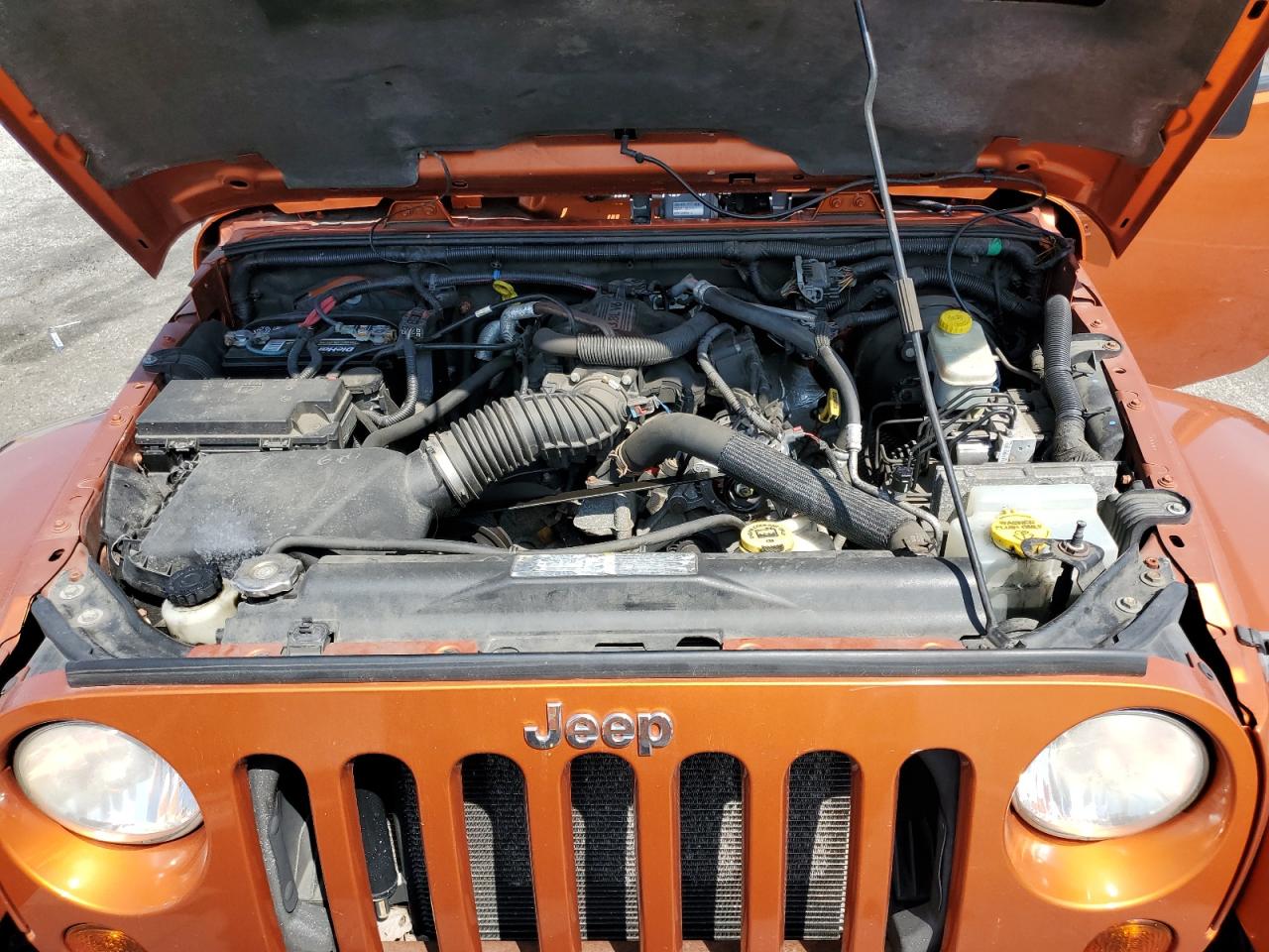 1J4BA5H17BL557211 2011 Jeep Wrangler Unlimited Sahara