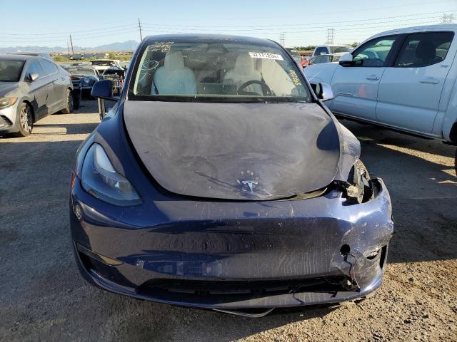 2023 Tesla Model Y VIN: 7SAYGDEE2PF897220 Lot: 52171204