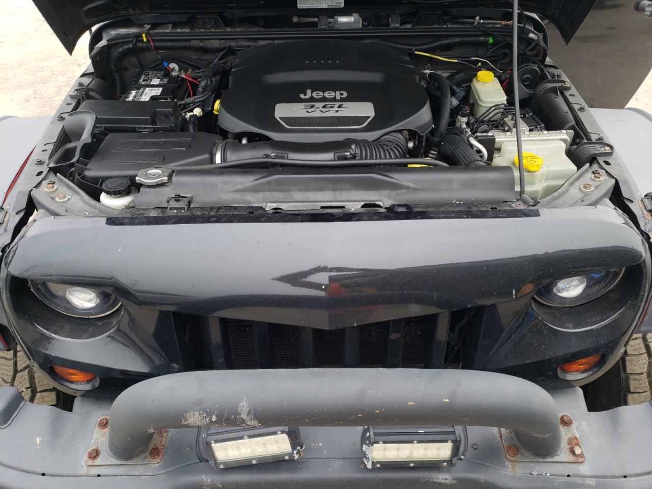 1C4GJWBG9DL566204 2013 Jeep Wrangler Sahara