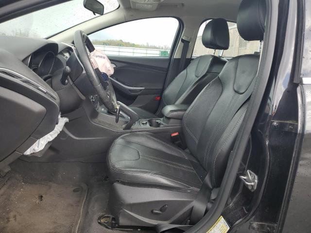 2014 Ford Focus Titanium VIN: 1FADP3J2XEL101802 Lot: 49819454