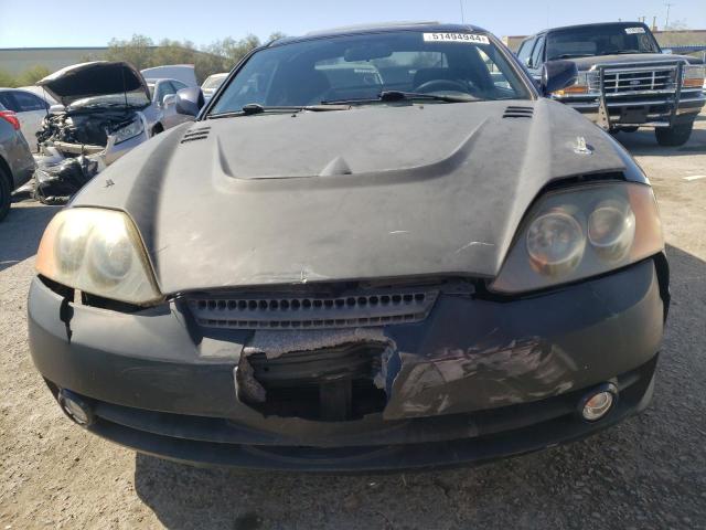 2004 Hyundai Tiburon VIN: KMHHM65D14U138811 Lot: 51494944