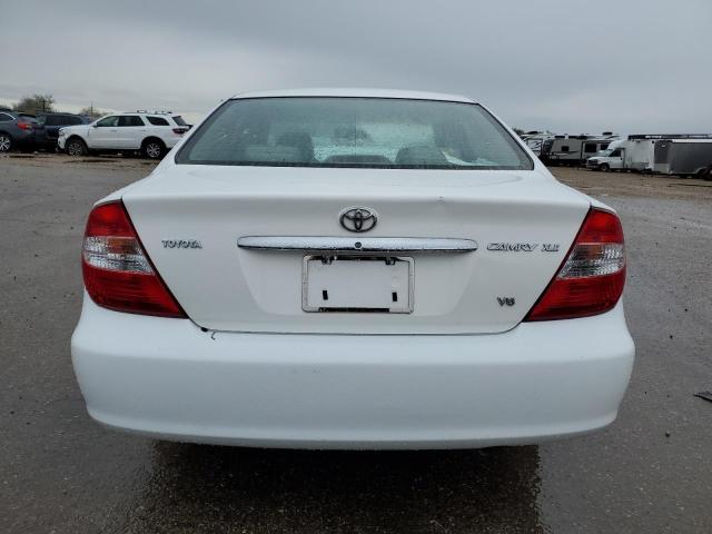 2002 Toyota Camry Le VIN: JTDBF30K120054985 Lot: 49391414