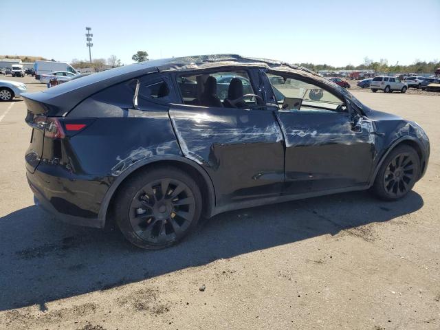 2023 Tesla Model Y VIN: 7SAYGDEE2PA034995 Lot: 51516764