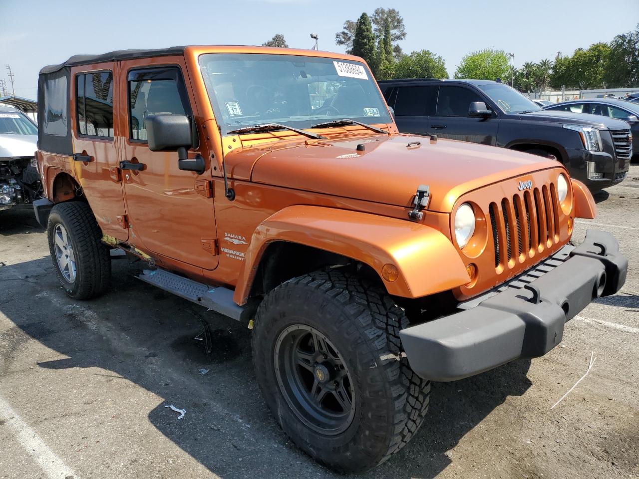 1J4BA5H17BL557211 2011 Jeep Wrangler Unlimited Sahara