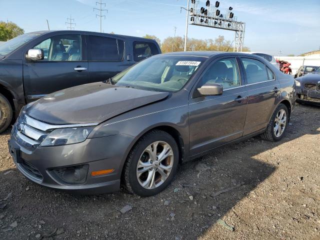 Lot #2501174218 2012 FORD FUSION SE salvage car