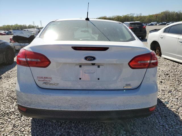 2018 Ford Focus Se VIN: 1FADP3FE7JL309438 Lot: 49817464