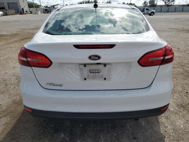 2017 Ford Focus S VIN: 1FADP3E27HL337791 Lot: 38518874