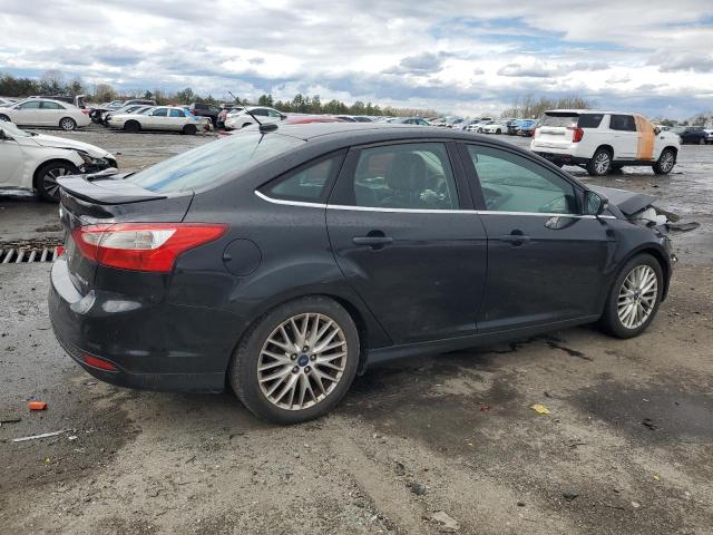2014 Ford Focus Titanium VIN: 1FADP3J2XEL101802 Lot: 49819454