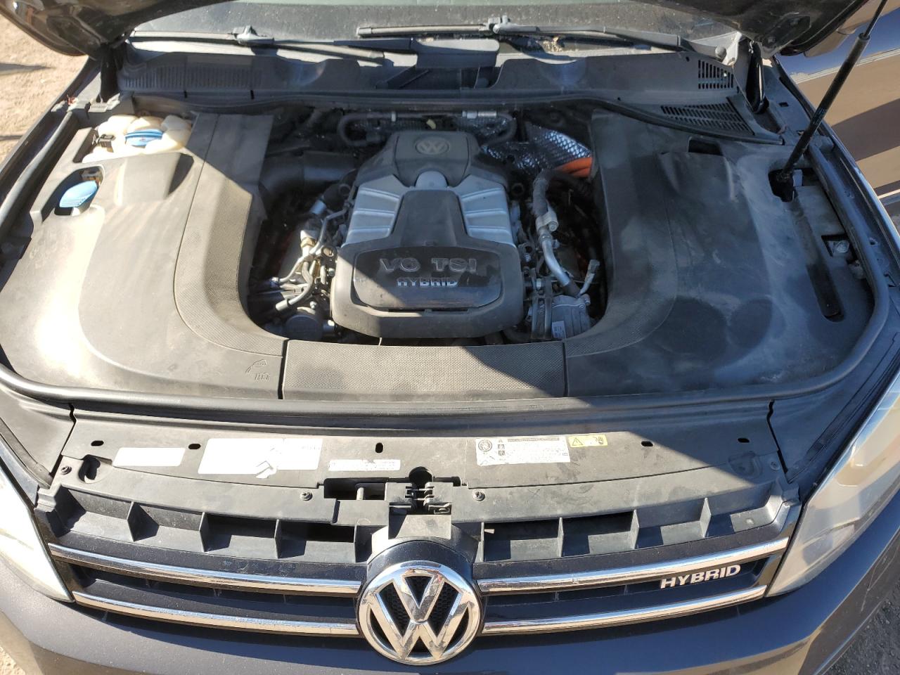 2012 Volkswagen Touareg Hybrid vin: WVGEG9BP9CD007716