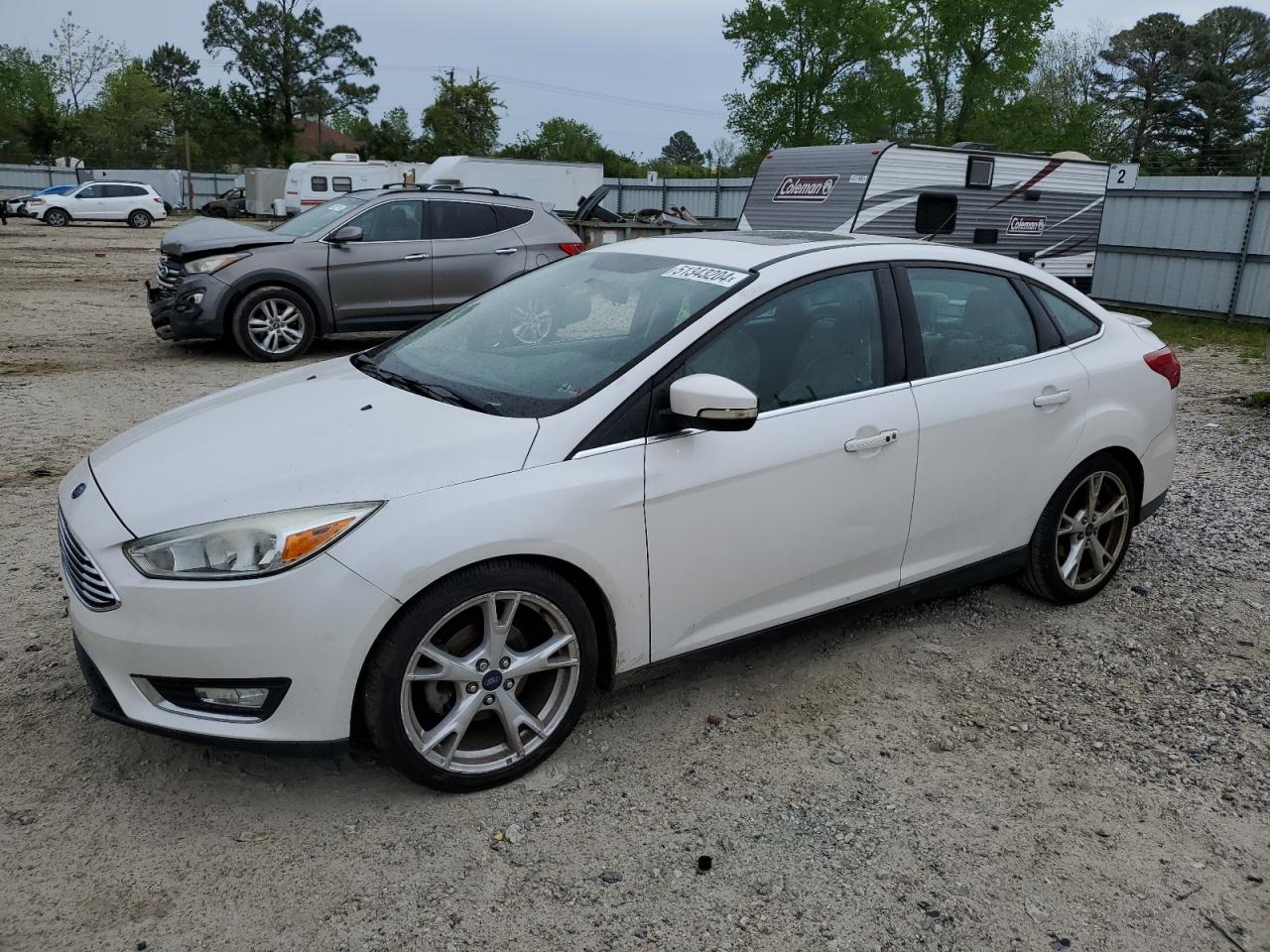 1FADP3J21GL335264 2016 Ford Focus Titanium