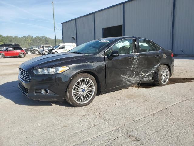 Lot #2471367884 2015 FORD FUSION SE salvage car