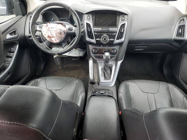 2014 Ford Focus Titanium VIN: 1FADP3J2XEL101802 Lot: 49819454