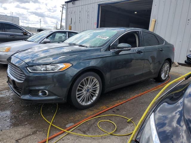 Lot #2487473602 2015 FORD FUSION SE salvage car