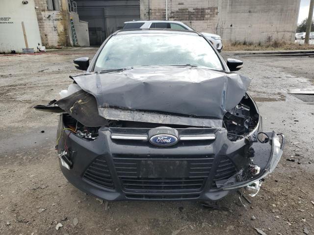 2014 Ford Focus Titanium VIN: 1FADP3J2XEL101802 Lot: 49819454