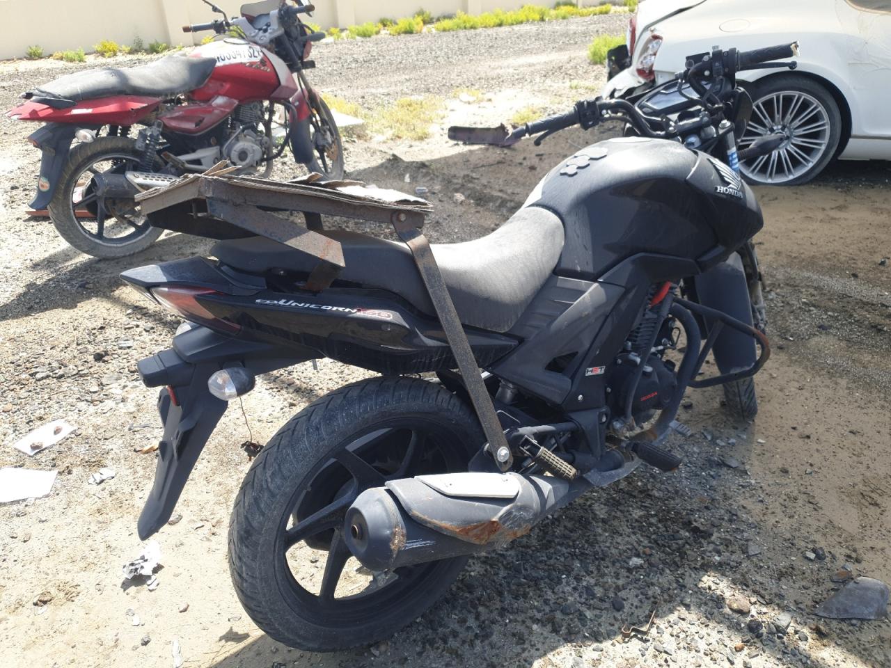 ME4KC20FXNA011741 Auction: COPART UAE Lot: 52358944 Location: DUBAI INDUSTRIAL CITY - DUBAI ME4KC20FXNA011741 HONDA UNICORN 2022 BLACK Photo 4