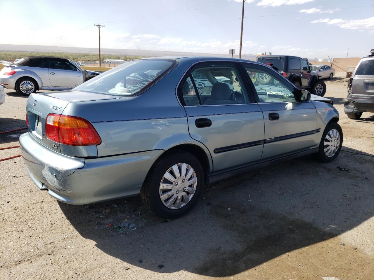 1HGEJ6677XL001019 1999 Honda Civic Lx