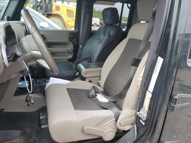 2010 Jeep Wrangler Unlimited Sahara VIN: 1J4HA5H11AL122354 Lot: 52073284