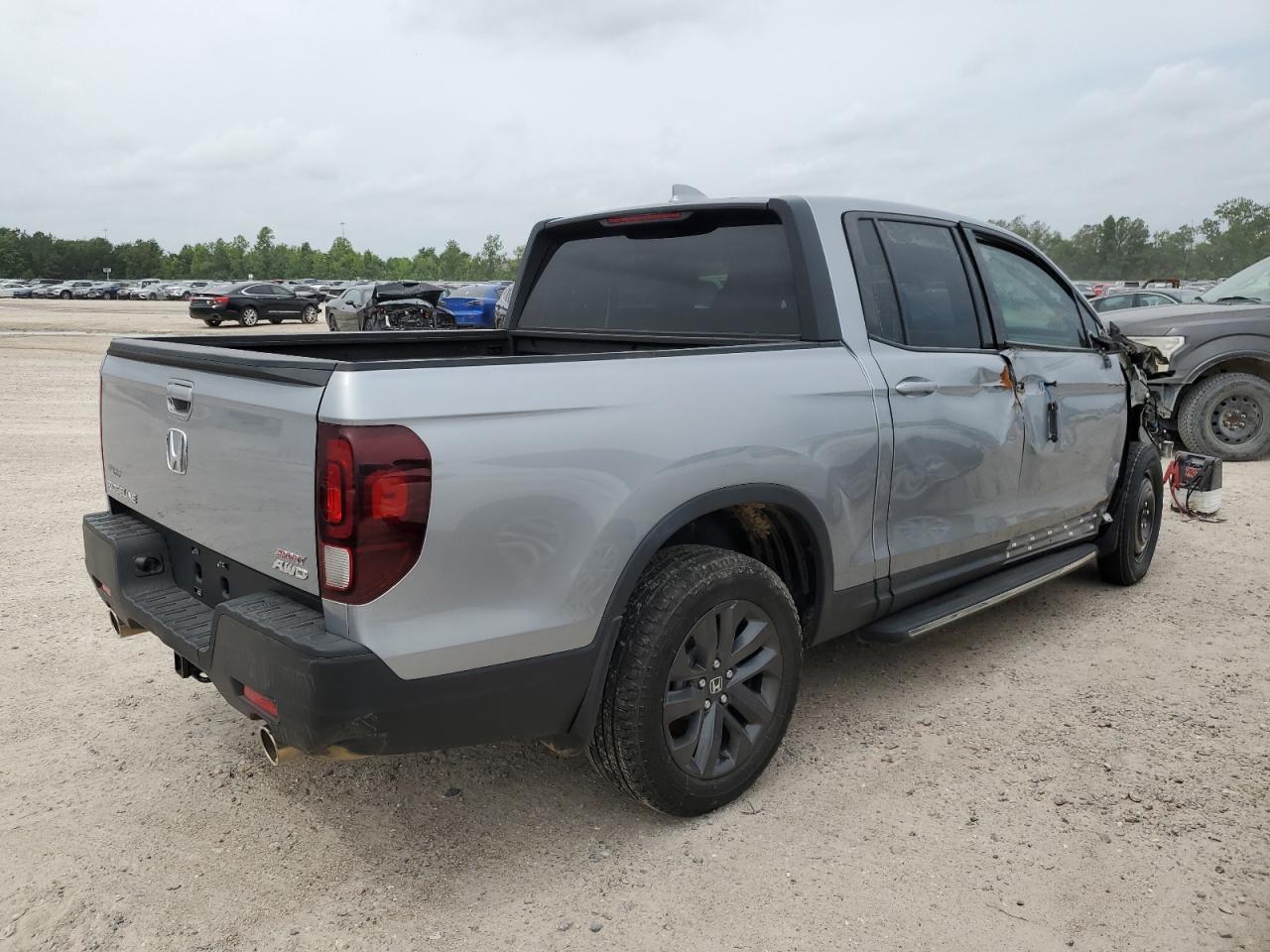 2023 Honda Ridgeline Sport vin: 5FPYK3F15PB039023