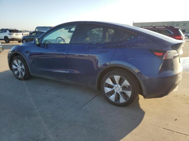 2023 Tesla Model Y VIN: 7SAYGAEE4PF704032 Lot: 50990284