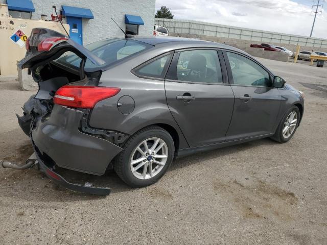 FORD FOCUS SE 2015 gray sedan 4d gas 1FADP3F27FL275742 photo #4