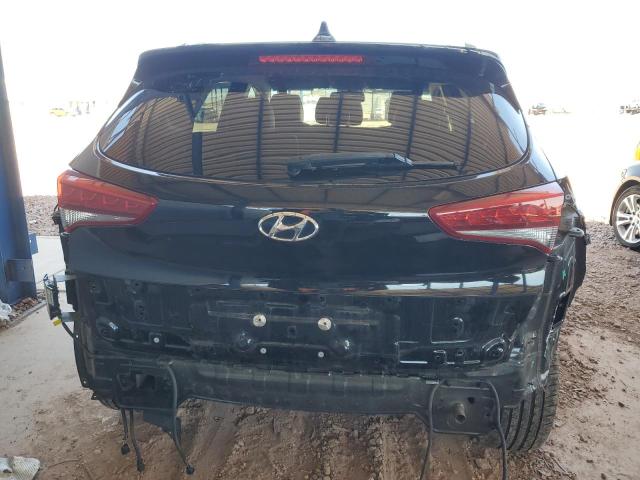 KM8J3CA25GU195105 2016 HYUNDAI TUCSON