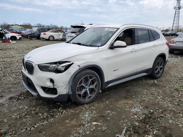 Vin: wbxht3c32j5f91637, lot: 52801695, bmw x1 xdrive28i 2018 img_1