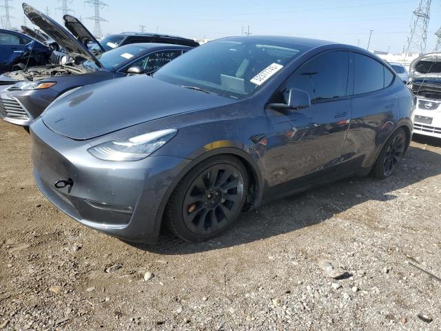 Vin: 7saygdee2nf389987, lot: 52377745, tesla model y 2022 img_1