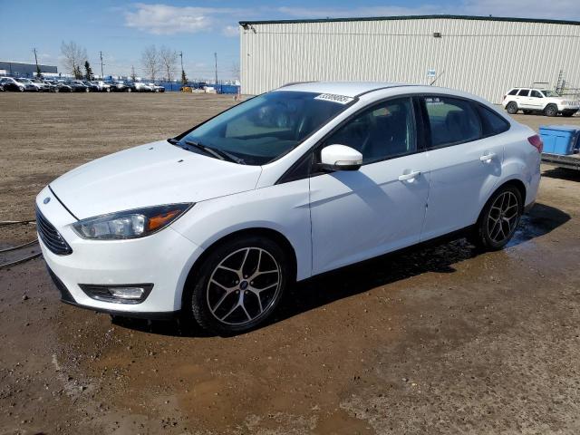 Vin: 1fadp3fe7jl317359, lot: 53309065, ford focus se 2018 img_1