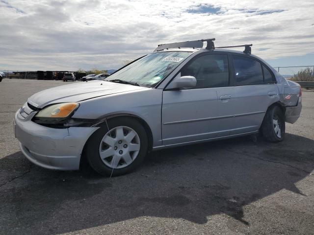 HONDA CIVIC 2002 silver  gas 1HGES26722L043502 photo #1