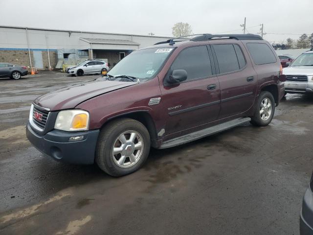 GMC ENVOY XL 2006 maroon 4dr spor gas 1GKET16S666163094 photo #1