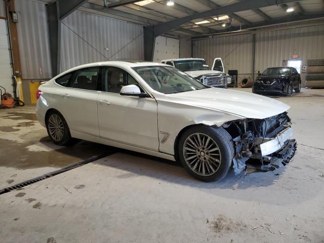 Vin: wba8z5c56fd672401, lot: 51132665, bmw 3 series xigt sulev 20154