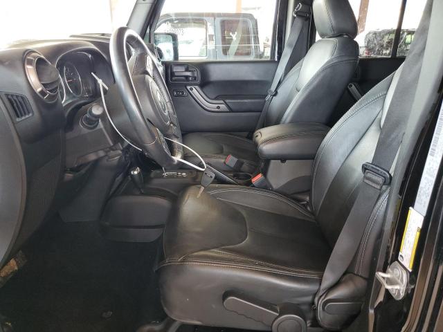 1C4BJWEG9JL890318 Jeep Wrangler Unlimited Sahara