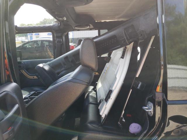 1C4BJWEG4EL199591 Jeep Wrangler Unlimited Sahara