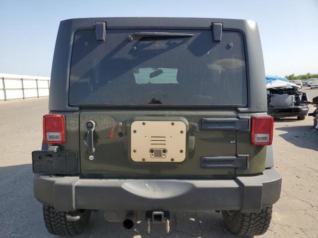 1C4BJWDG9FL638061 Jeep Wrangler Unlimited Sport