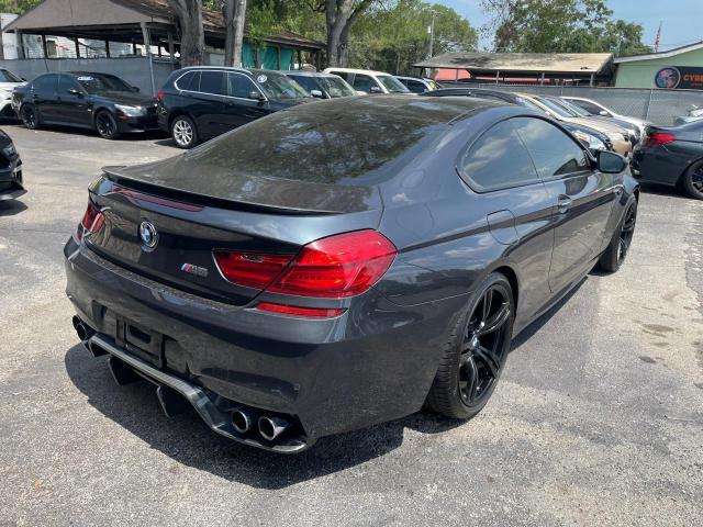 VIN: WBS6J9C3XHD934830 Auction: COPART Lot: 52531843 Location: FL - TAMPA SOUTH WBS6J9C3XHD934830 BMW M6 2017 GRAY Photo 4
