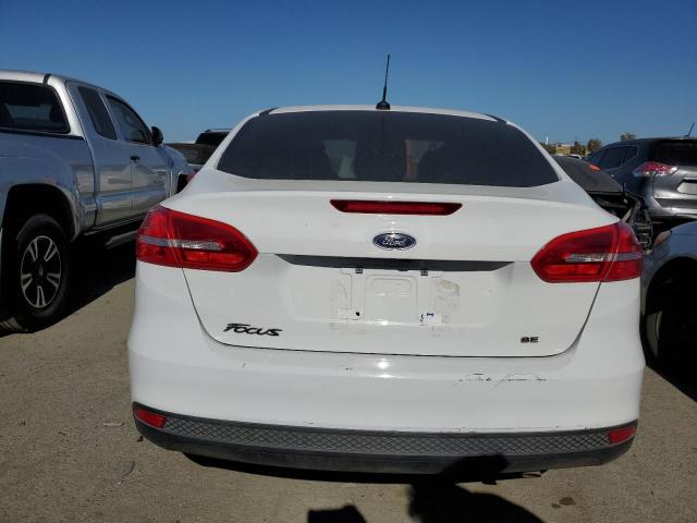 2018 Ford Focus Se VIN: 1FADP3F22JL236677 Lot: 52402403