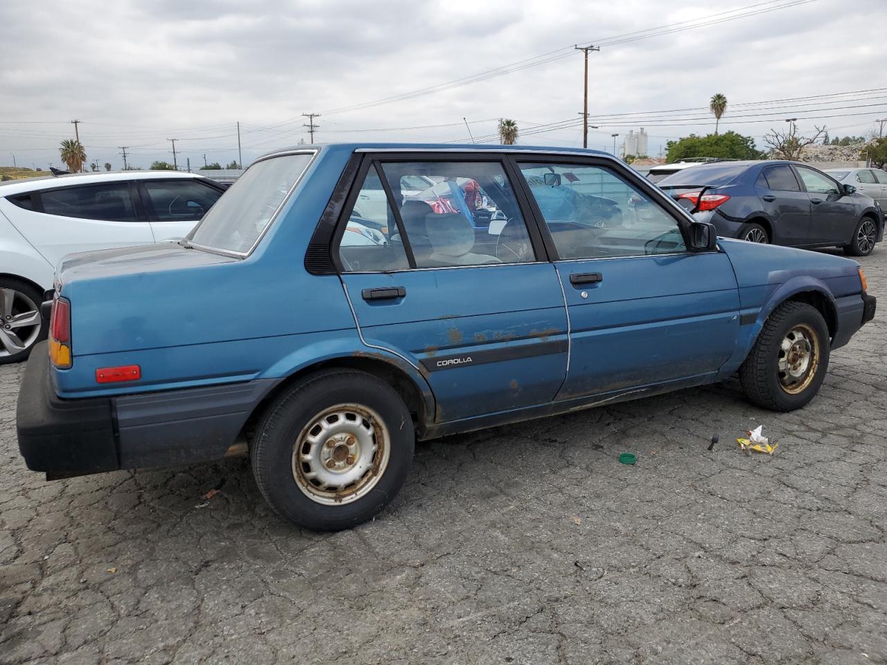 JT2AE83E7F3212860 1985 Toyota Corolla Le