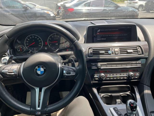 VIN: WBS6J9C3XHD934830 Auction: COPART Lot: 52531843 Location: FL - TAMPA SOUTH WBS6J9C3XHD934830 BMW M6 2017 GRAY Photo 9