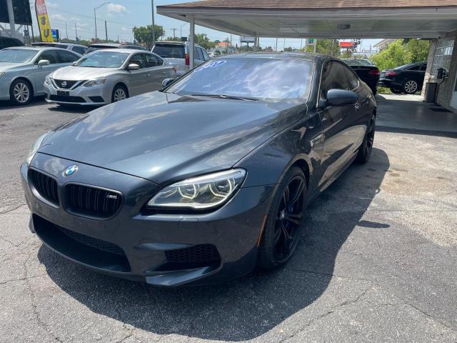 VIN: WBS6J9C3XHD934830 Auction: COPART Lot: 52531843 Location: FL - TAMPA SOUTH WBS6J9C3XHD934830 BMW M6 2017 GRAY Photo 2