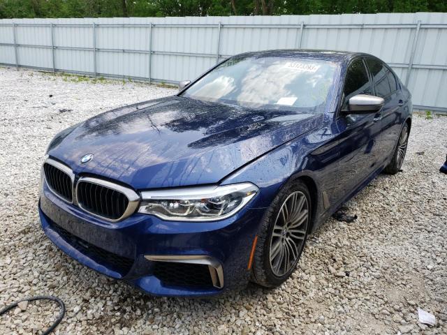 Купить б/у BMW M5 VI (F90) 4.4 AT (600 л.с.) 4WD бензин автомат в Москве: серый 