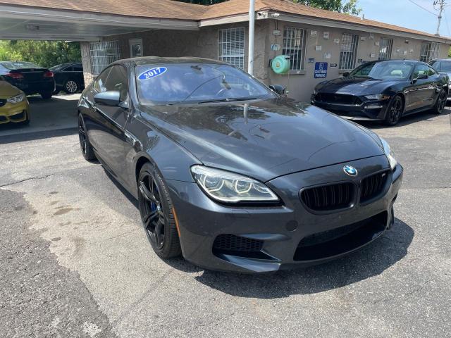 VIN: WBS6J9C3XHD934830 Auction: COPART Lot: 52531843 Location: FL - TAMPA SOUTH WBS6J9C3XHD934830 BMW M6 2017 GRAY Photo 1