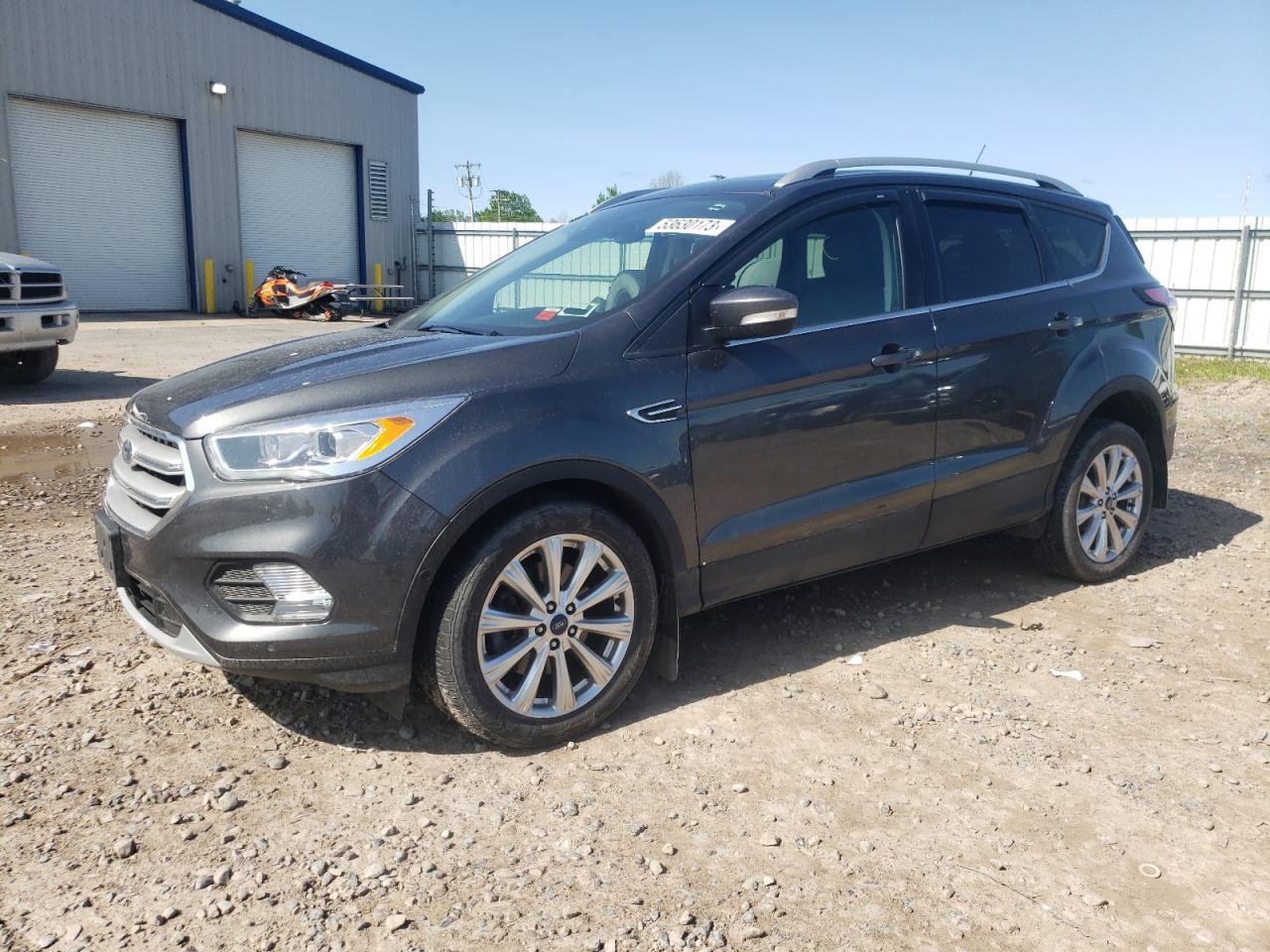 1FMCU9J90JUD13056 FORD ESCAPE TIT 2018