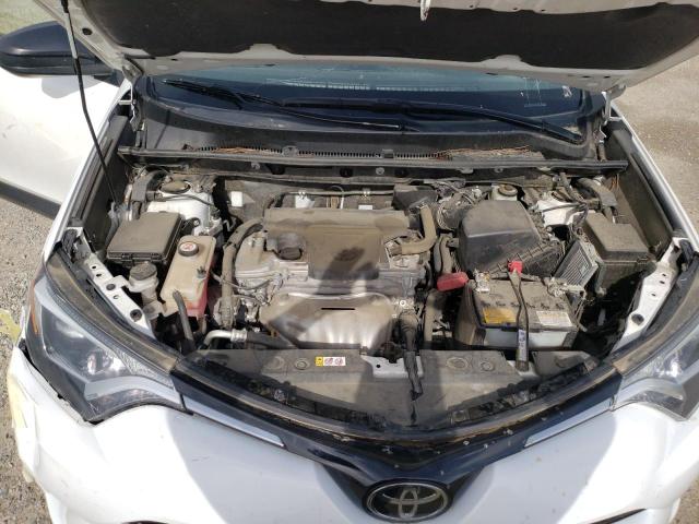 JTMZFREV2JD129446 Toyota RAV4 LE