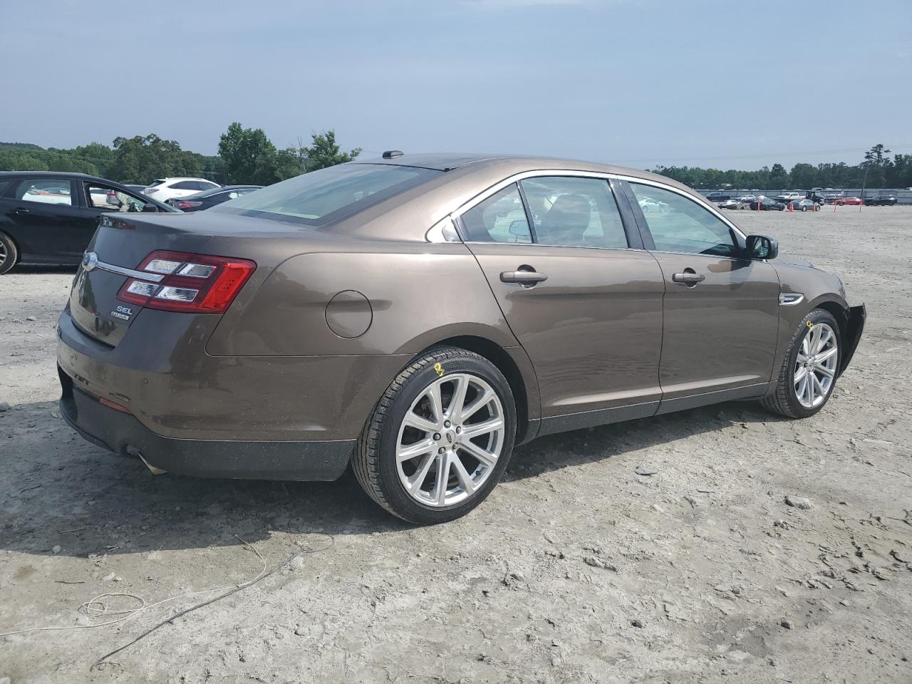 1FAHP2E8XFG142709 2015 Ford Taurus Sel