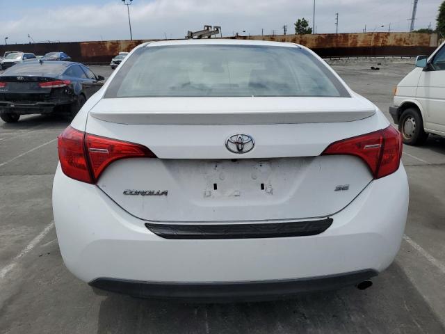 2018 Toyota Corolla L VIN: 5YFBURHE5JP760899 Lot: 54802374