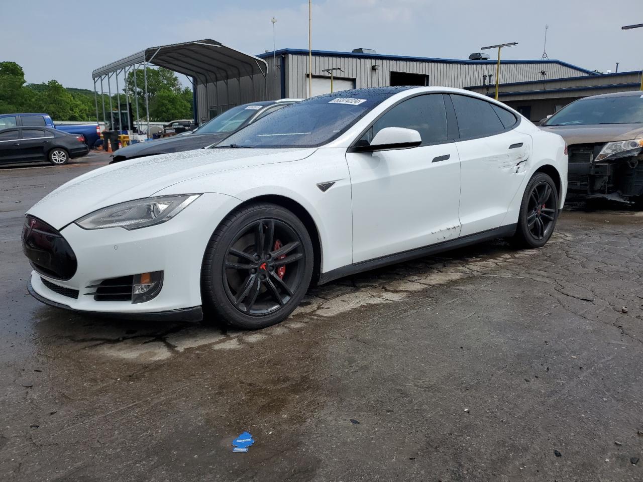 5YJSA1S1XEFP40097 2014 Tesla Model S