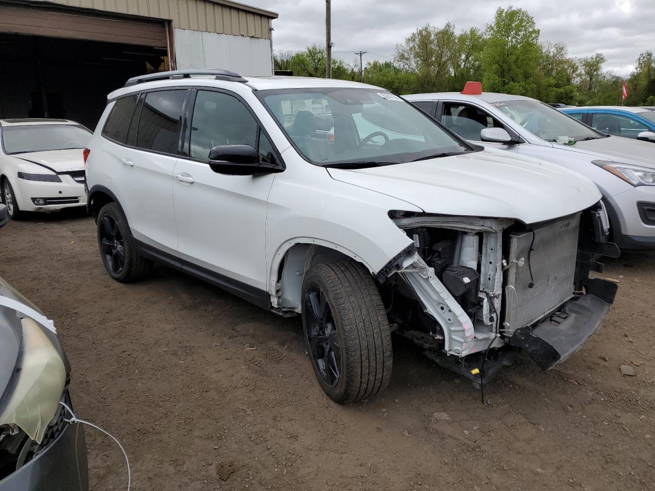 2021 Honda Passport Elite vin: 5FNYF8H07MB024291